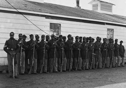 Here the men of Co. E, 4th United States Colored Infantry are photographed in their dress uniforms at Fort Lincoln in Washington, D.C., c. 1864. (Courtesy Library of Congress Prints and Photographs Division, Washington, D.C.) Here the men of Co. E, 4th United States Colored Infantry are photographed in th