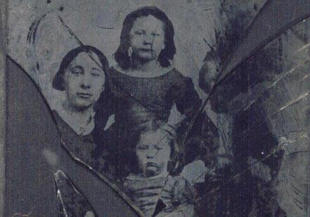 Elizabeth Tillotson with Georgiana (standing) and Lucy in 1862. Son Leon is on the right. His image was effaced by damage to the tintype when George tried to clean it. The Gilder Lehrman Collection. Elizabeth Tillotson with Georgiana (standing) and Lucy in 1862. Son Leon is on t