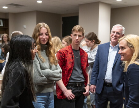 McCormick Family Foundation–Gilder Lehrman Scholars Elisabet Guerrero Hernandez, Olivia Korach, and Ethan Roy converse with Kim Viggiano '00 as Martin Shaffer (Dean of the School of Liberal Arts at Marist) looks on.