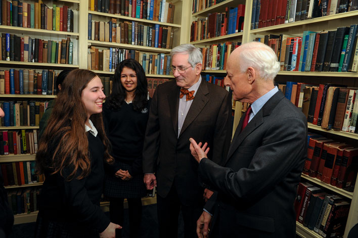 Richard Gilder (left) and Lewis Lehrman (right) speak with students at Notre Dame Preparatory Academy.