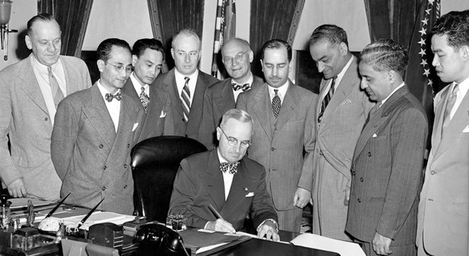 President Harry S. Truman signing the Luce-Celler Act into law, July 2, 1946 (Harry S. Truman Presidential Library & Museum)