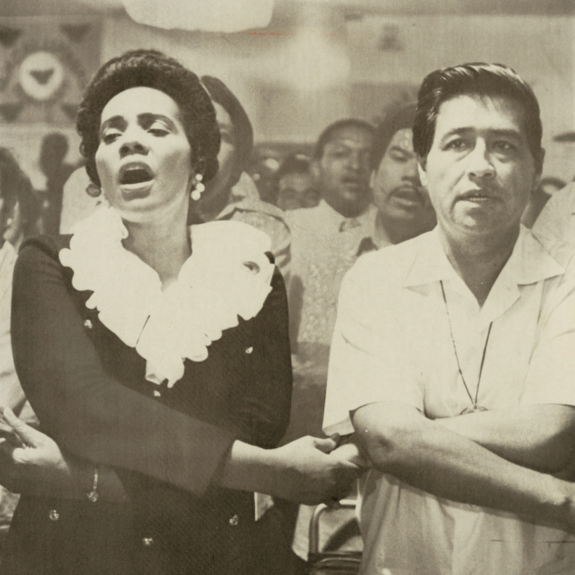 Cesar Chavez, president of the United Farm Workers (UFW) joining hands with Coretta Scott King in 1972 protesting for farmer workers' rights.