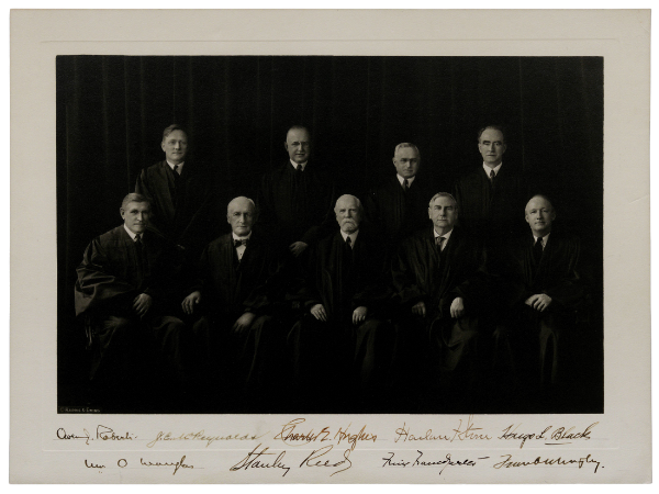 Formal group portrait of the Supreme Court Justices in robes, ca. 1940 (GLC02929)