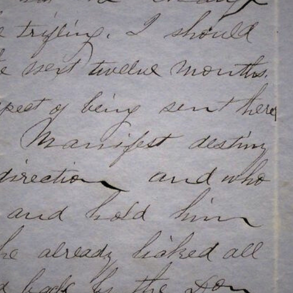19th century handwriting with words Manifest Destiny in focus