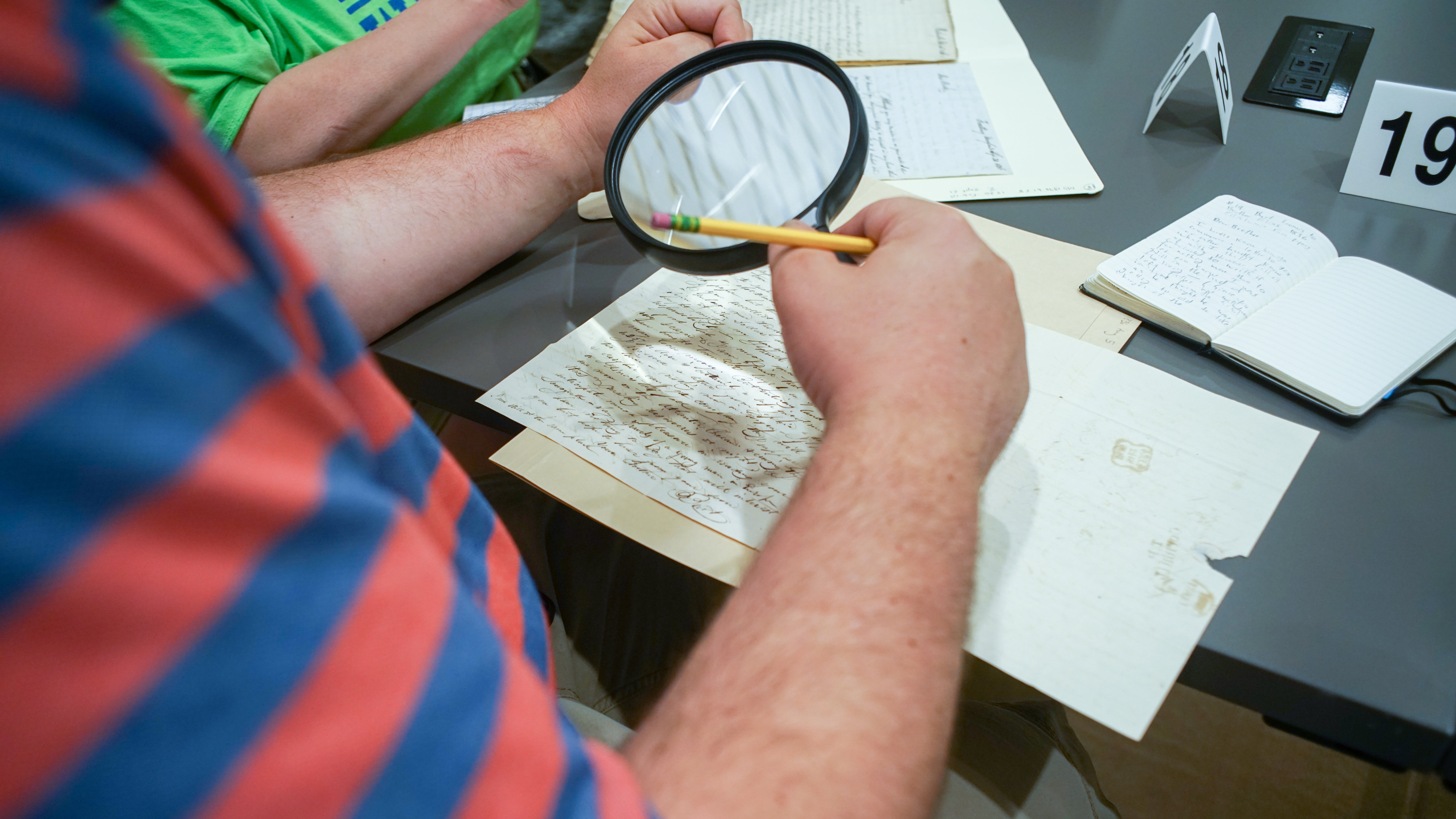 Teachers examine primary sources