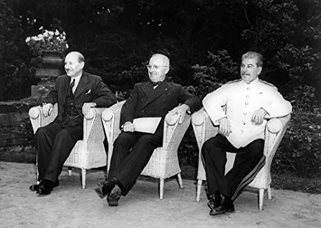 From left to right, British Prime Minister Clement Attlee, President Harry S. Truman, and Soviet Prime Minister Josef Stalin seated in the garden during the Potsdam Conference. (Harry S. Truman Library & Museum) 