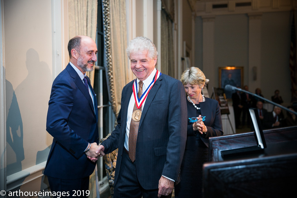 Colin Calloway is presented with the 2019 George Washington Prize medal, flanked by Adam Goodheart of Washington College and Sarah Coulson of the Mount Vernon Ladies' Association.