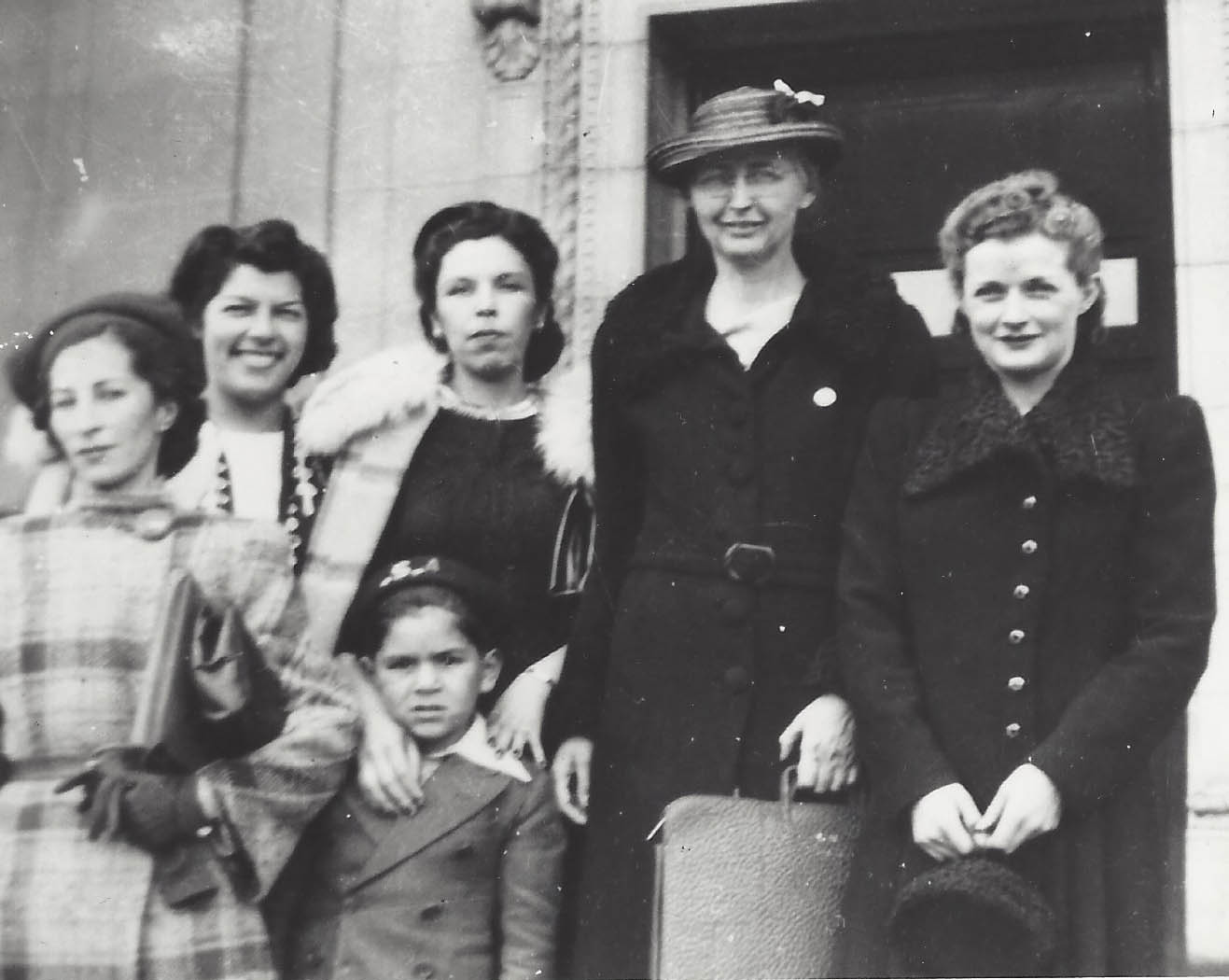 UCAPAWA negotiating committee, including labor leader Luisa Moreno, far left, and Carmen Bernal Escobar, third from left with hands around her son Alfred (Courtesy of Edward Escobar)