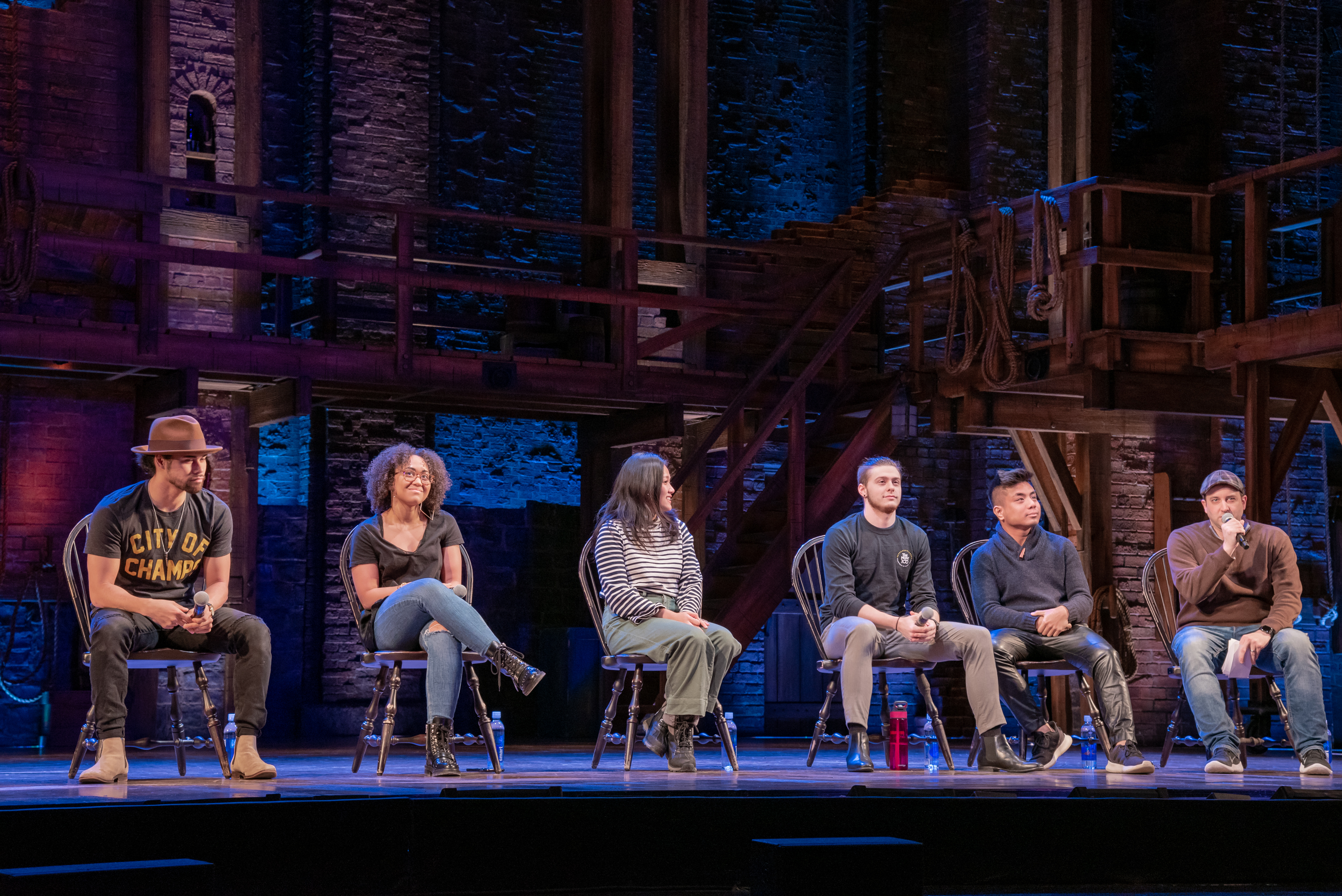Actors from a touring cast of Hamilton in Pittsburgh in January of 2019 answer questions from an EduHam matinee audience.