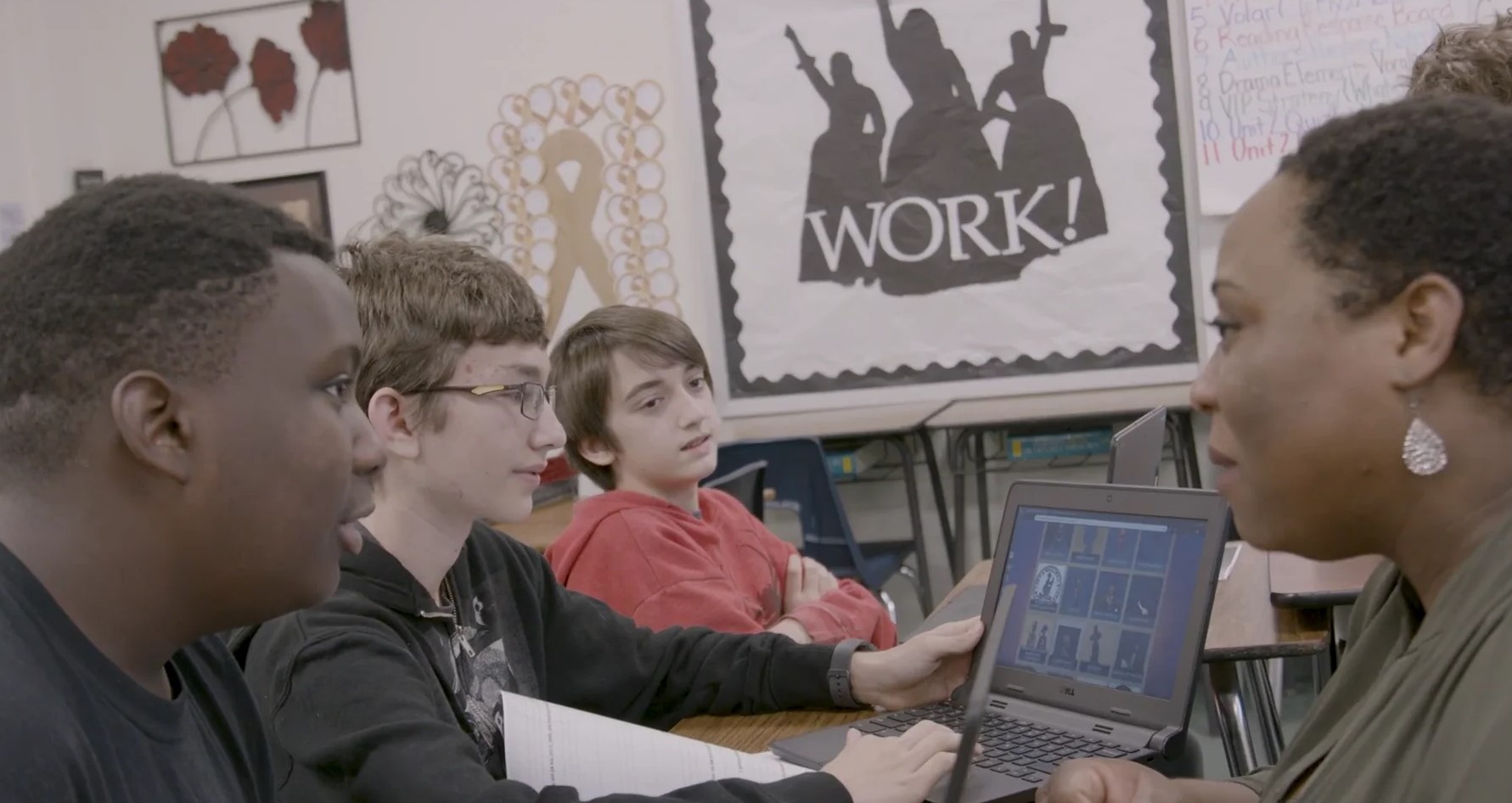 Students work with a teacher on the EduHam Online curriculum.