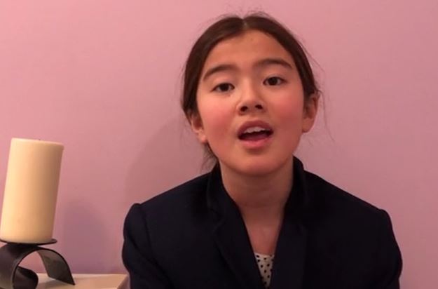 An 8th grader from St. Monica Catholic Elementary School in Santa Monica, California, performs her original song "Aaron Burr Lament."