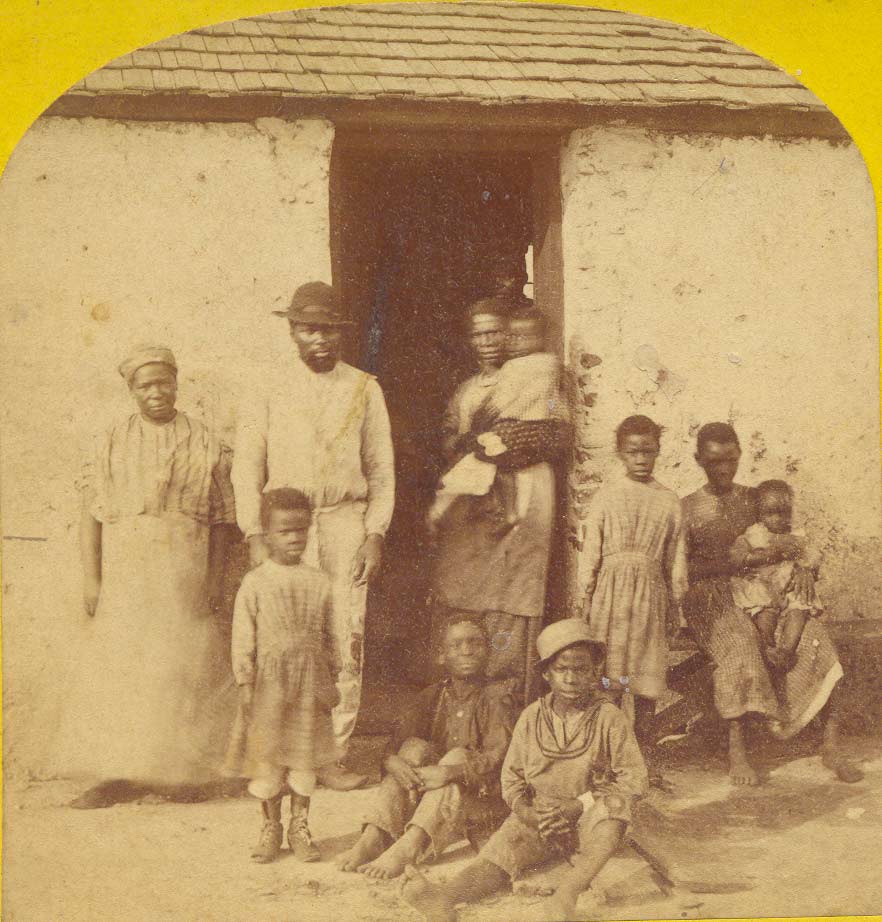 Detail from a stereoview image of freedmen and their families living in the tabby cabins on Kingsley Plantation in 1875. (Private collection)