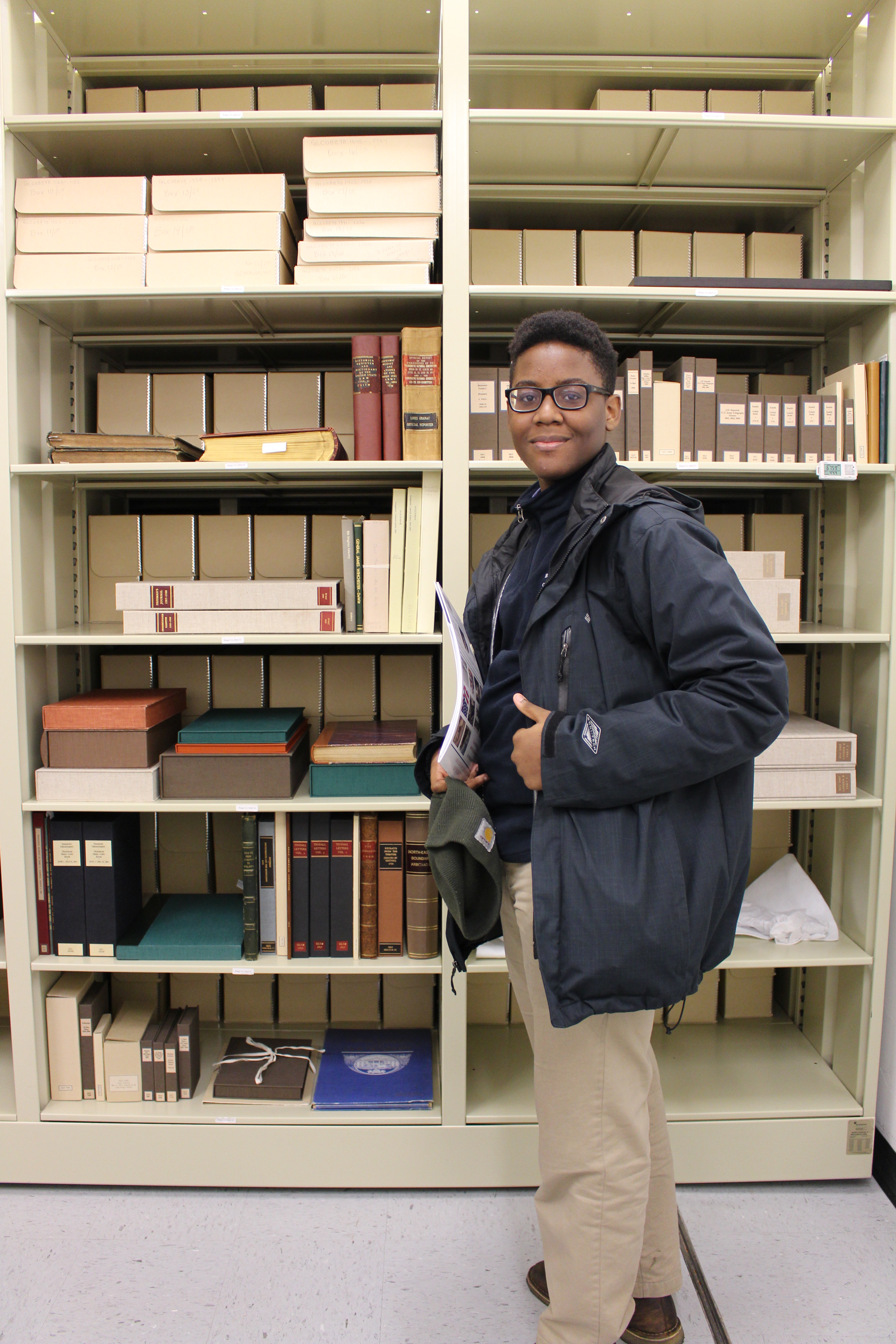 A Brooklyn Collegiate student in the vault at the Gilder Lehrman Collection.