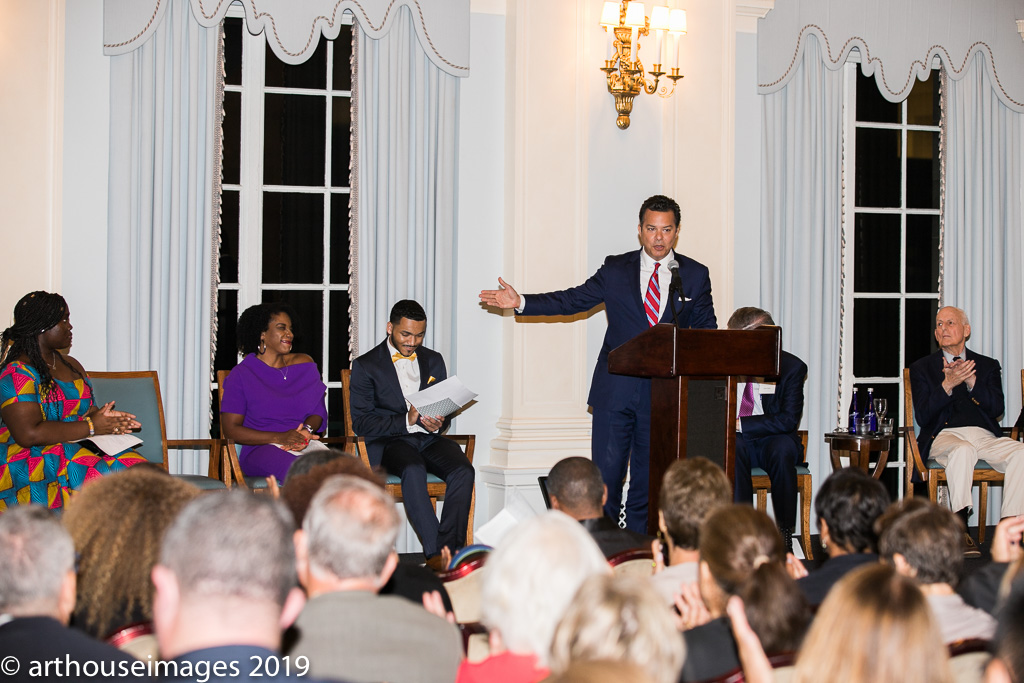 CNN Senior Political Analyst John Avlon presents 2019 National History Teacher of the Year Alysha Butler with her award. 