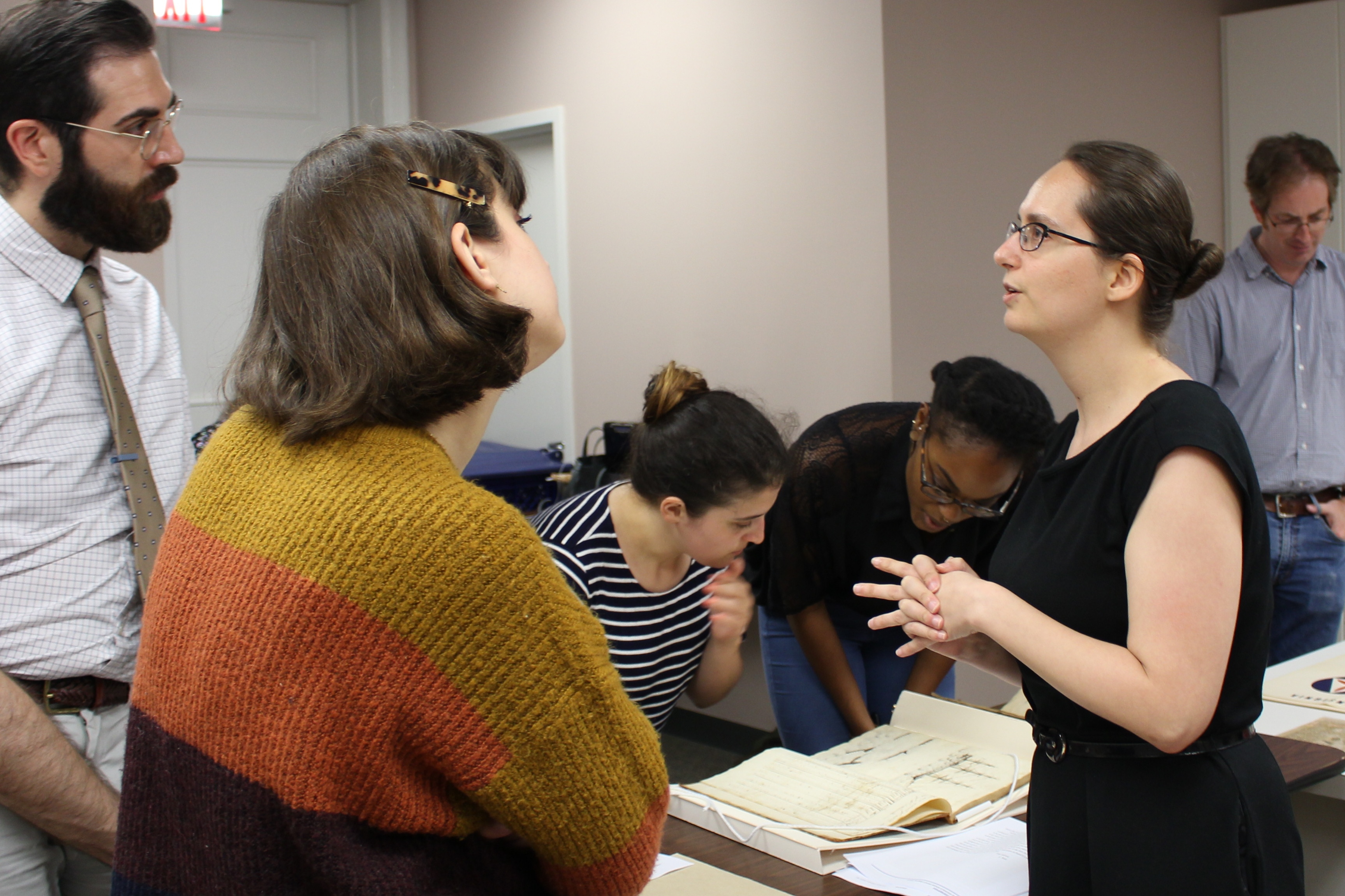 Curatorial Assistant Laura Hapke speaks with Marketing Intern Olivia Luntz and Hamilton Education Program Coordinator William Roka at a recent staff day at the Gilder Lehrman Collection.