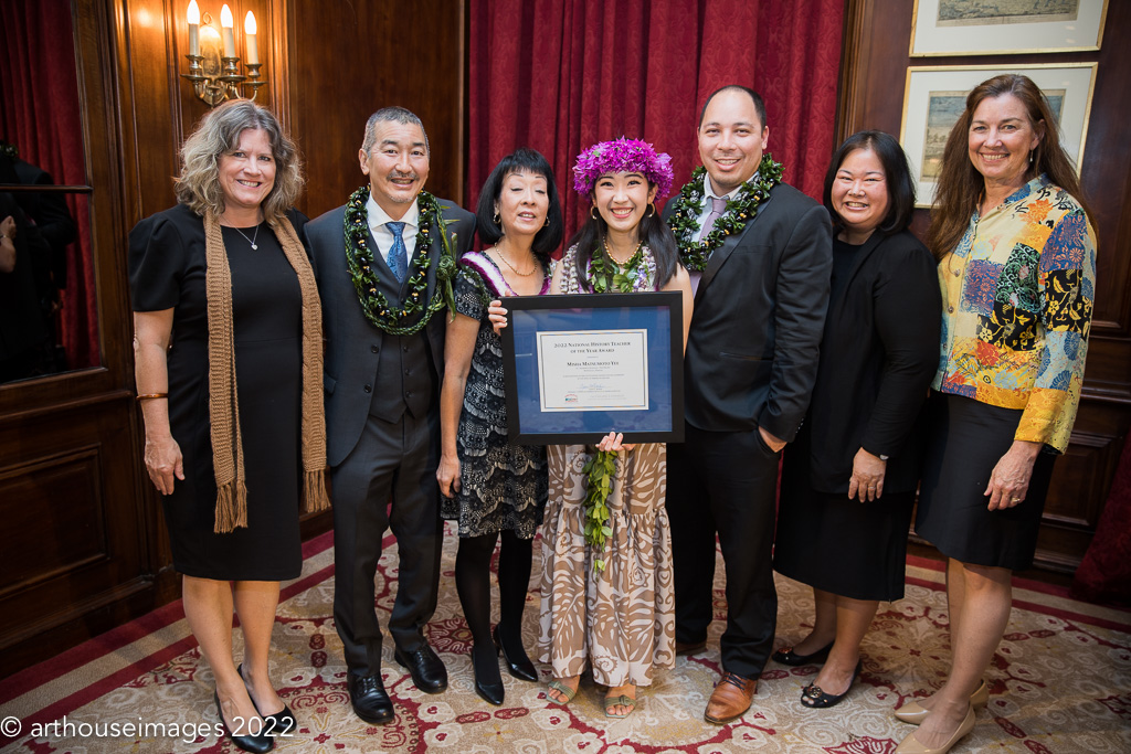 Misha Matsumoto Yee with her family and colleagues from St. Andrew's Schools in Hawaii at the 2022 award ceremony