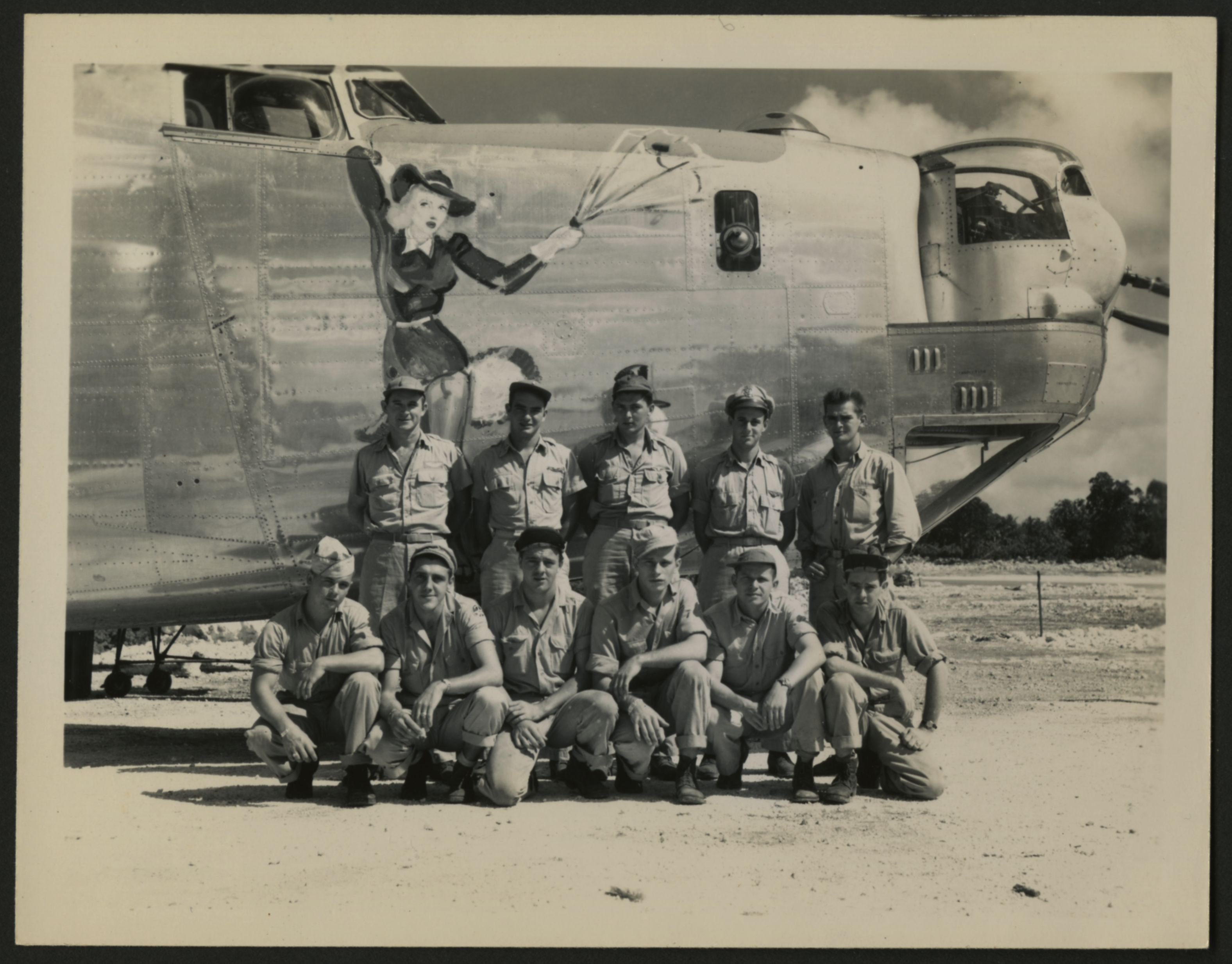 Robert L. Stone’s crew in front of the Flying Jenny, Guam, 1945