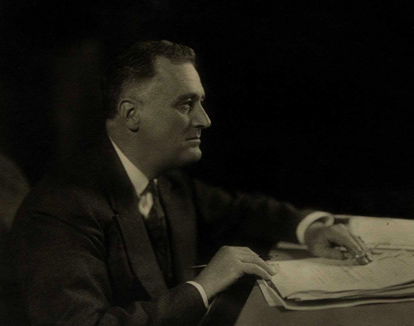 Large photograph of Franklin Roosevelt signing a document, ca. 1935 (Gilder Lehrman Institute, GLC04675.06)