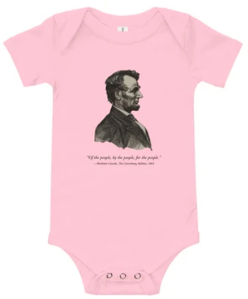 The Abraham Lincoln onesie comes in pink, grey, and white.