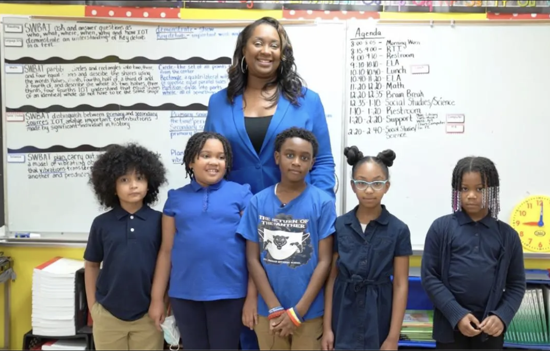 2022 National History Teacher of the Year Finalist Melissa Collins with students at John P. Freeman School in Memphis, TN. Photo courtesy of Memphis-Shelby County Schools