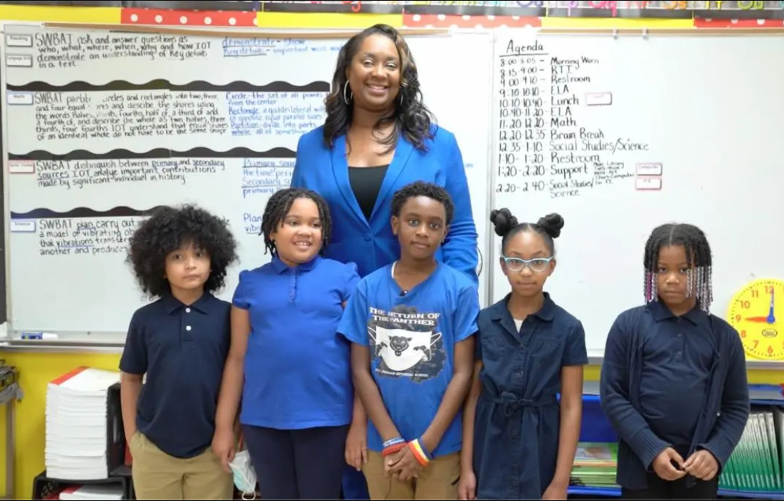 2022 National History Teacher of the Year Finalist Melissa Collins with students at John P. Freeman School in Memphis, TN. Photo courtesy of Memphis-Shelby County Schools