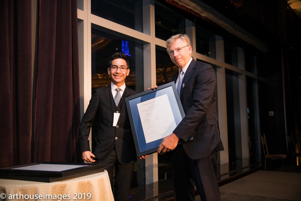 Student Advisory Council member Sebastian Lopez with honoree Bob Niehaus