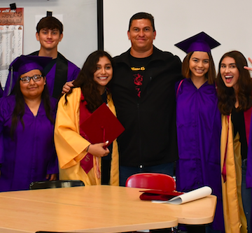 2020 National History Teacher of the Year Sergio de Alba with graduating students