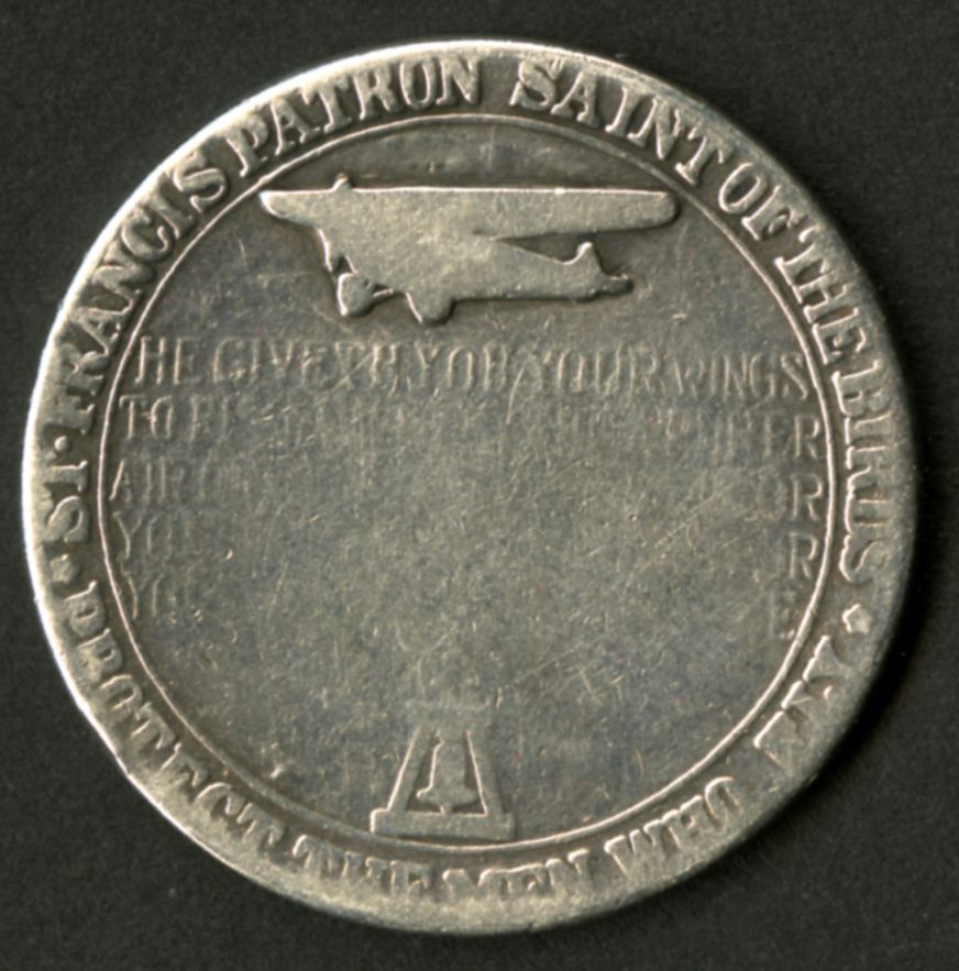 Bob Stone's St. Francis Medal carried on every mission.  (The Gilder Lehrman Institute, GLC09620)