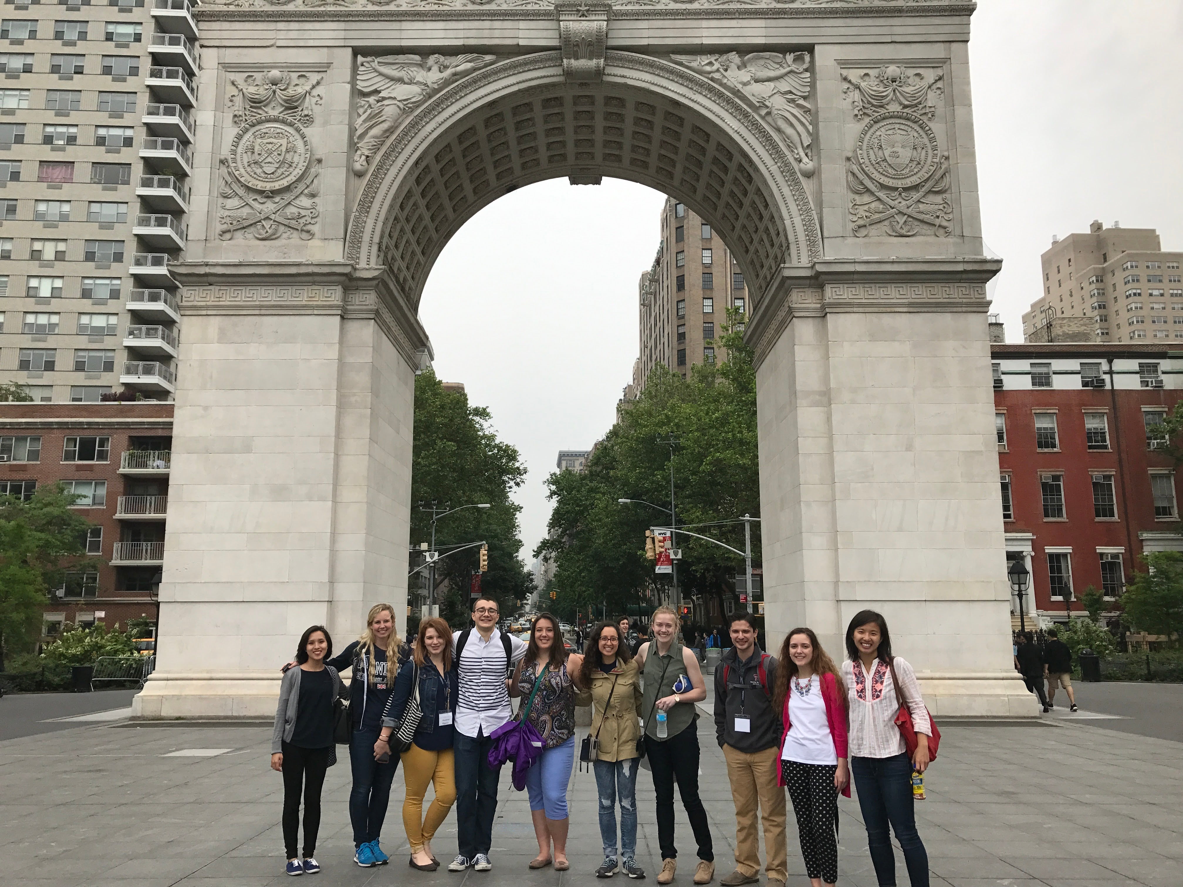 Jacob (fourth from left) and some of his fellow scholars pose in front of the Washington Square Arch