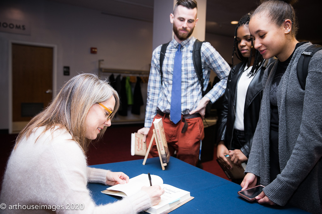 Winner of the 2019 Frederick Douglass Book Prize, Amy Murrell Taylor, signs books for students.