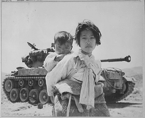 A war-weary Korean at Haengju, Korea. 1951. (NARA)