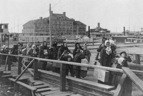 Landing at Ellis Island, ca. 1902 (LC-USZ62-12595)