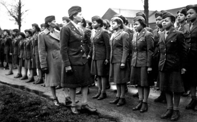 Major Charity E. Adams and Captain Abbie N. Campbell inspect WACs in England, February 1945. (National Archives)
