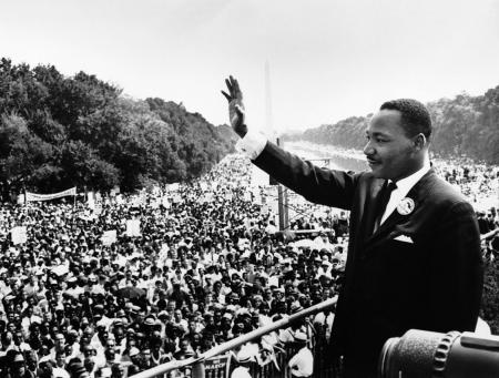 Martin Luther King Jr. addresses a crowd from the steps of the Lincoln Memorial,