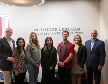 From left to right, Gilder Lehrman Institute trustee Michael McCormick (Marist '88), Marist College trustee Genine McCormick '88, Elisabet Guerrero Hernandez '25, Olivia Korach '26, Ethan Roy '26, Kim Viggiano '00, and Marist Dean of the School of Liberal Arts Martin Shaffer.