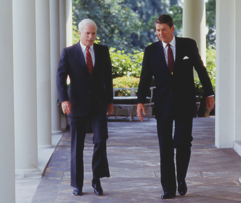 Photo of John McCain and Ronald Reagan walking together
