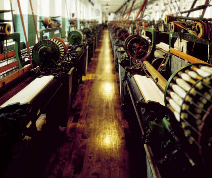 Modern day photograph showing rows of looms at the old Boott Cotton Mill No. 6 in Lowell, Massachusetts 
