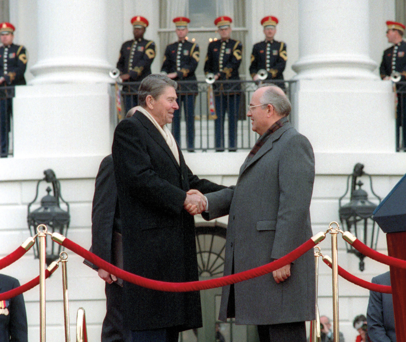 Photograph showing Ronald Reagan and Mikhail Gorbachv shaking hands