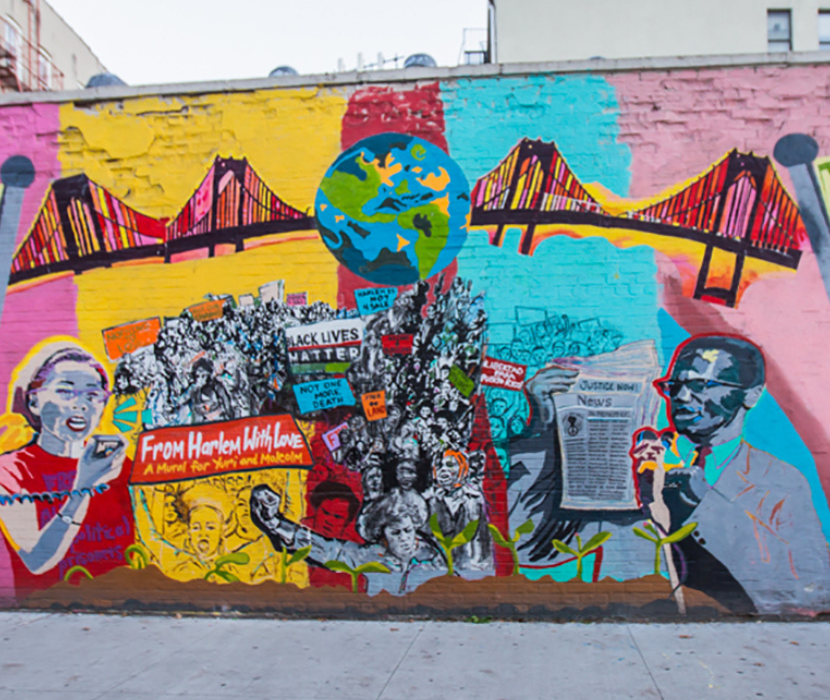 Mural in Harlem, N.Y., depicting Yuri Kochiyama, a Japanese-American civil rights activist, and her friend Malcolm X