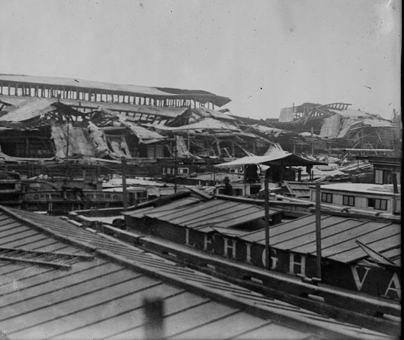 Black and white photograph of the Lehigh Valley pier after the Black Tom explosion