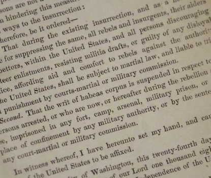 Detail from printed orders suspending writ of habeas corpus with focus on text stating as much