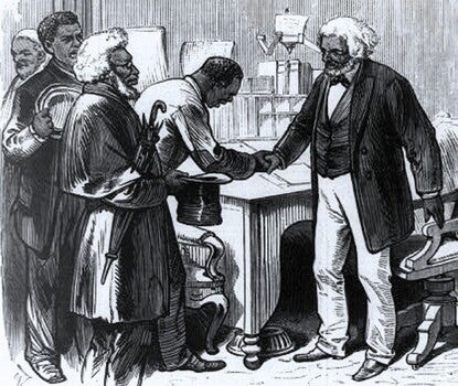 An engraving of a white-haired Frederick Douglass standing at a desk, wearing a dark jacket and waistcoat, dark bow tie, and white shirt and pants, shaking the hand of another Black man wearing a white shirt, as others wait to greet him at left