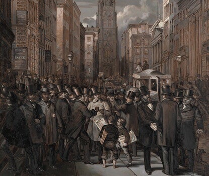 A large group of White men in top hats congregating in a city street with a steeple in the background