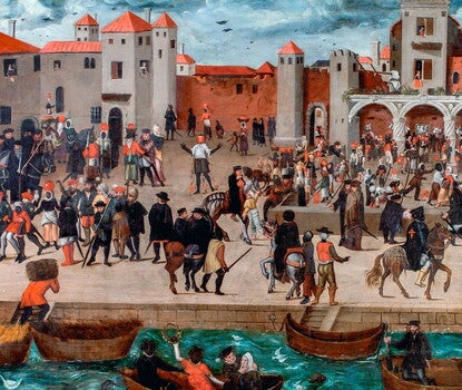 A port in a medieval city, with Black and White people on boats and walking about on land 