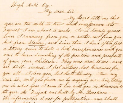 A handwritten letter in cursive on lined paper