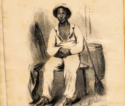 A black-and-white engraving of Solomon Northup, a Black man wearing a white hat, shirt, and pants, sitting on a box, a broomstick leaning against his left arm. Below the image, the name Solomon Northup in handwriting and the words "In his plantation suit"