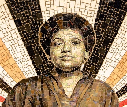 A mosaic featuring a black and white portrait of Audre Lorde surrounded by bursts of gold, white, and black tiles.