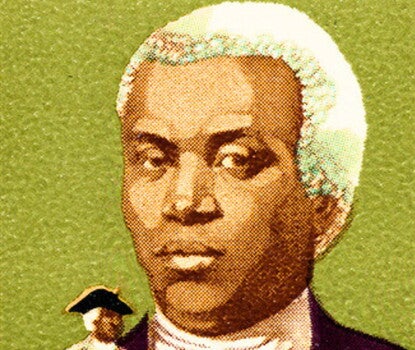 Image of a Benjamin Banneker postal stamp featuring a portrait of Banneker with a smaller, full-body illustration of Banneker with a telescope in the foreground. 