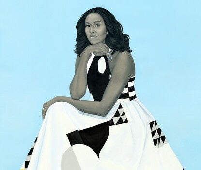 Michelle Obama, presented in a gray skin tone, in a white dress with patches of colored stripes and triangles in front of a powder-blue background. Her right hand rests on her chin as her left hand rests on her knee.