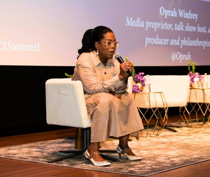 Oprah Winfrey addressing the audience at the Women's Summit on Empowerment, Entrepreneurship, and Engagement.